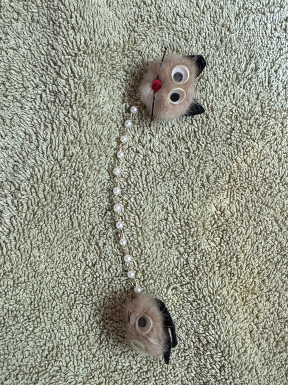 Vintage Sweater Guard Clip with Cats linked by a gold and pearl chain